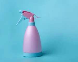 pink and white spray bottle
