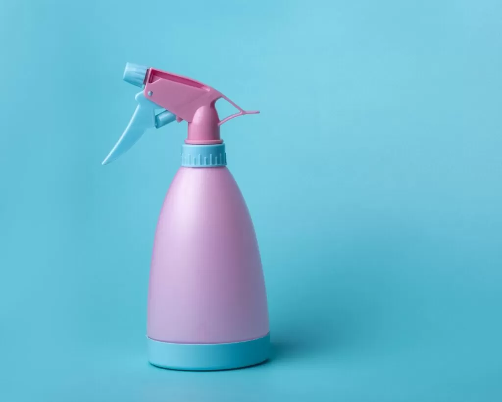 pink and white spray bottle